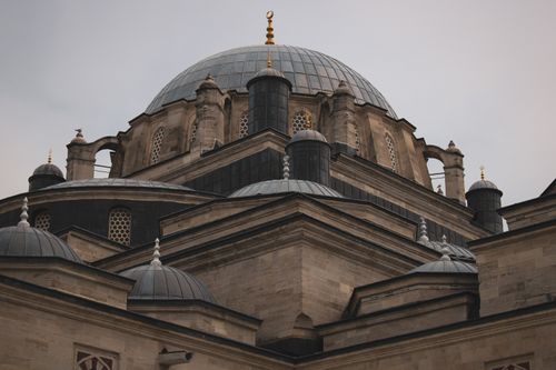Free Low-angle shot showcasing the intricate architecture of Fatih Mosque's dome in Istanbul, Turkey. Stock Photo