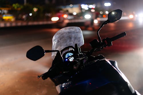 Free Black Motorcycle With White Helmet Stock Photo