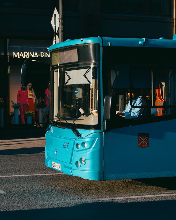 Blue Bus On The Street