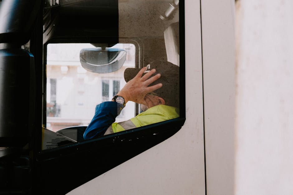 Driver of a Truck Resting