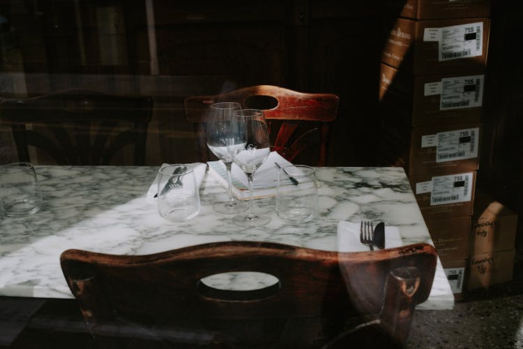 Clear Glasses On A Granite Table