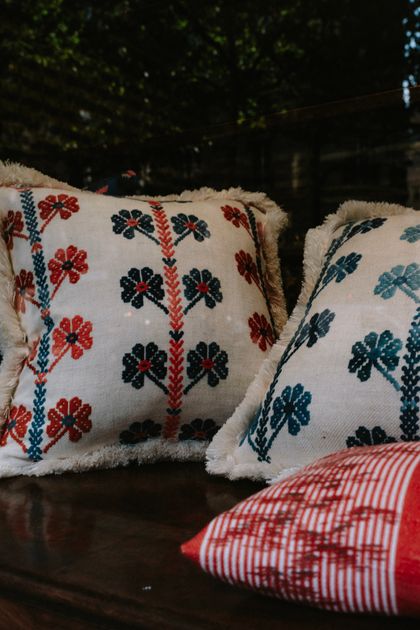 Embroidered cotton cushions, photo by Mathias Reding on Pexels