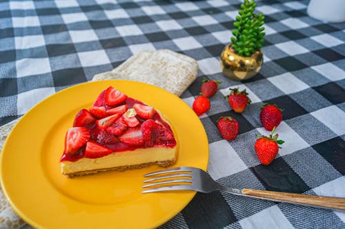 Free Cake with Strawberries on Yellow Plate Stock Photo