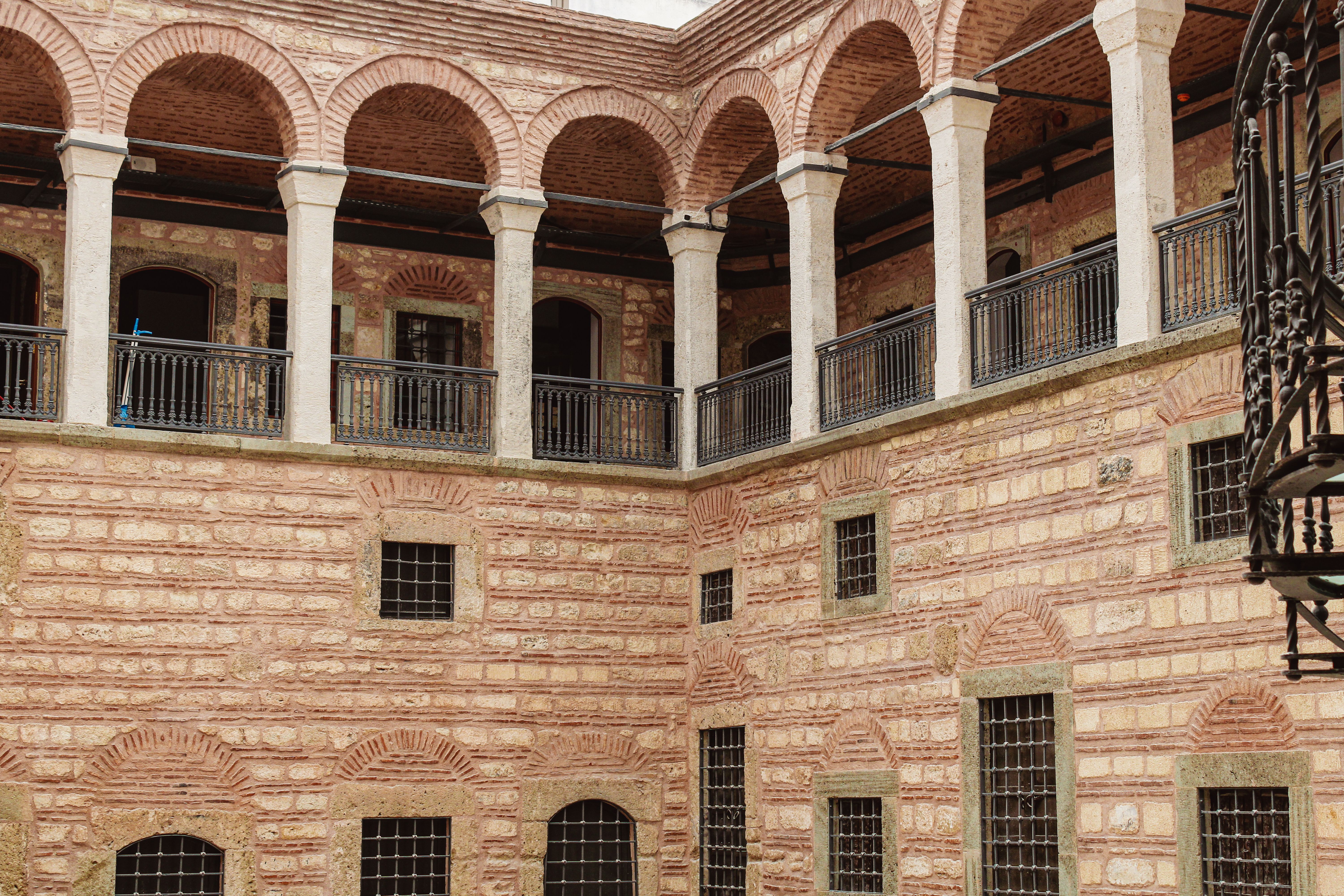 Elegant courtyard of historic building in Istanbul, Turkey, showcasing Ottoman architecture.
