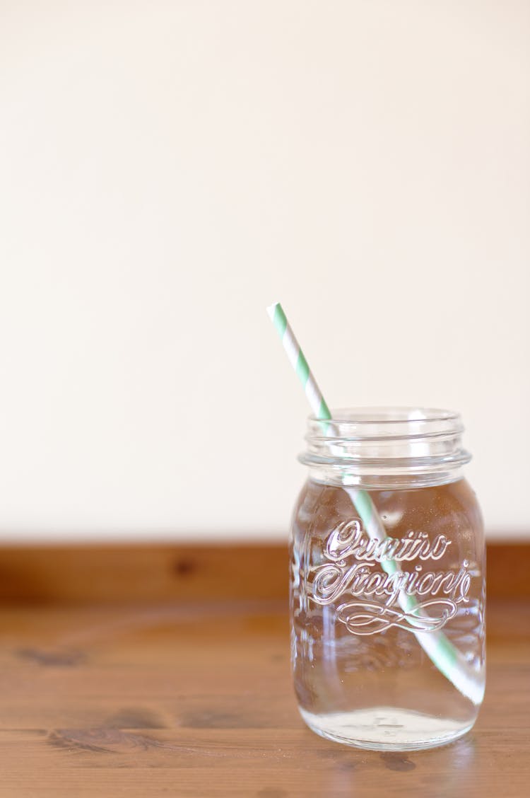 Clear Glass Mason Jar Filled With Water