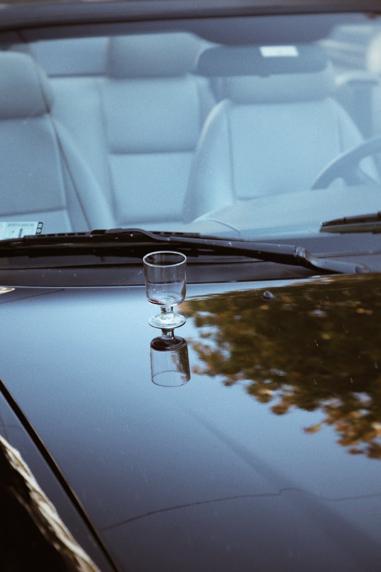 Reflection Of Glass In Car Hood