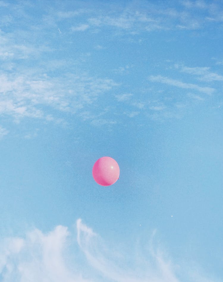 Pink Balloon Floating In The Air