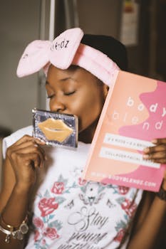 African American woman enjoying a skincare routine indoors with Bodyblendz collagen kit.