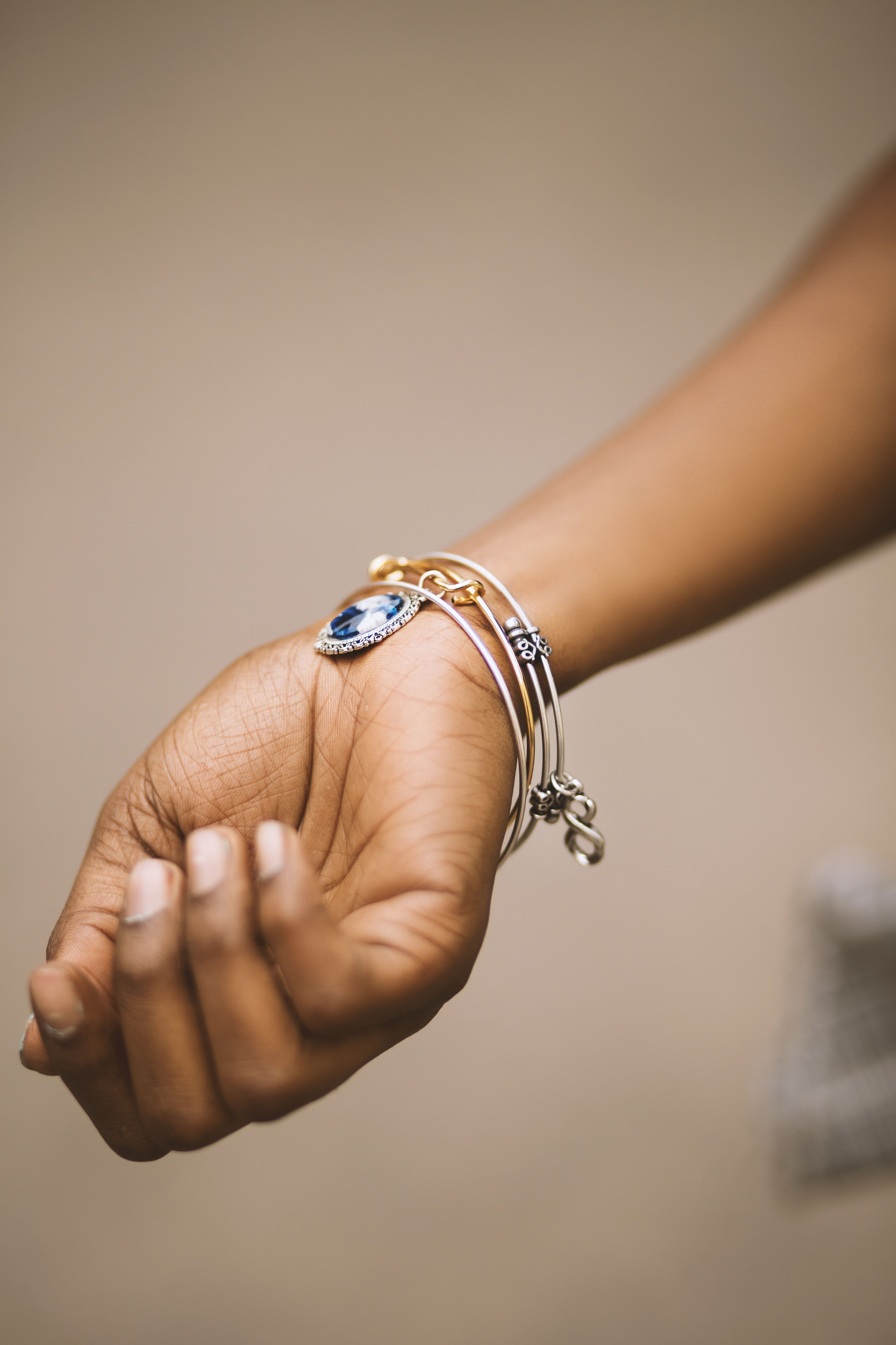 Woman wearing a silver bracelet as part of an everyday look