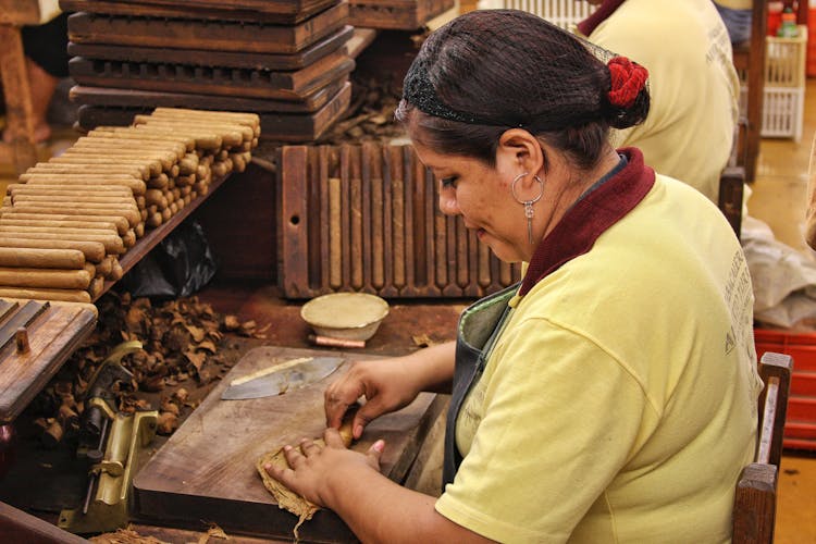 Woman Making Hand Rolled Cigars