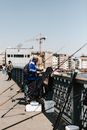 People Fishing on the River