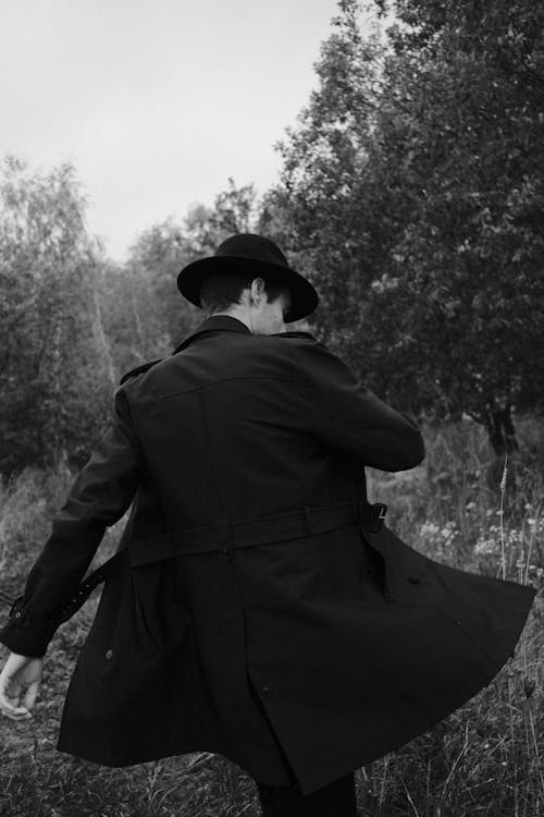 Man in Black Jacket on Meadow