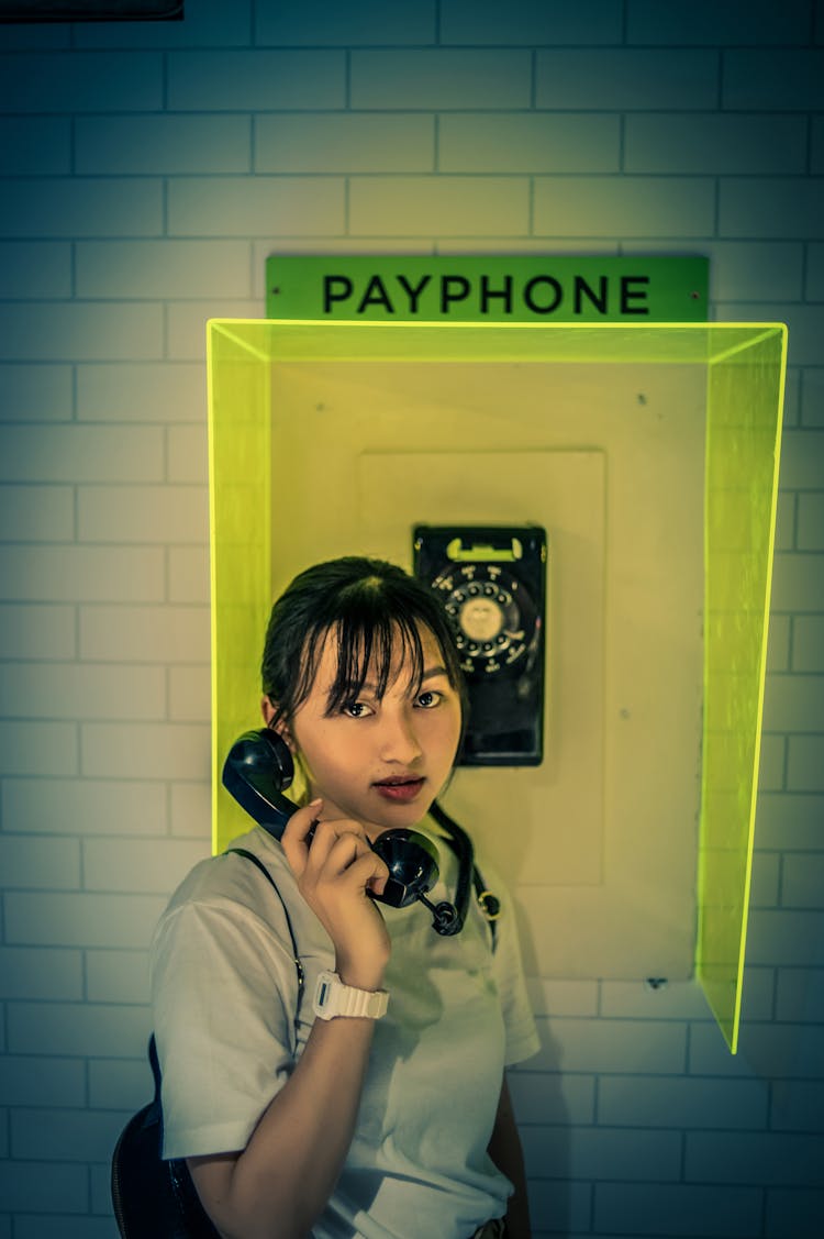 Woman At The Payphone