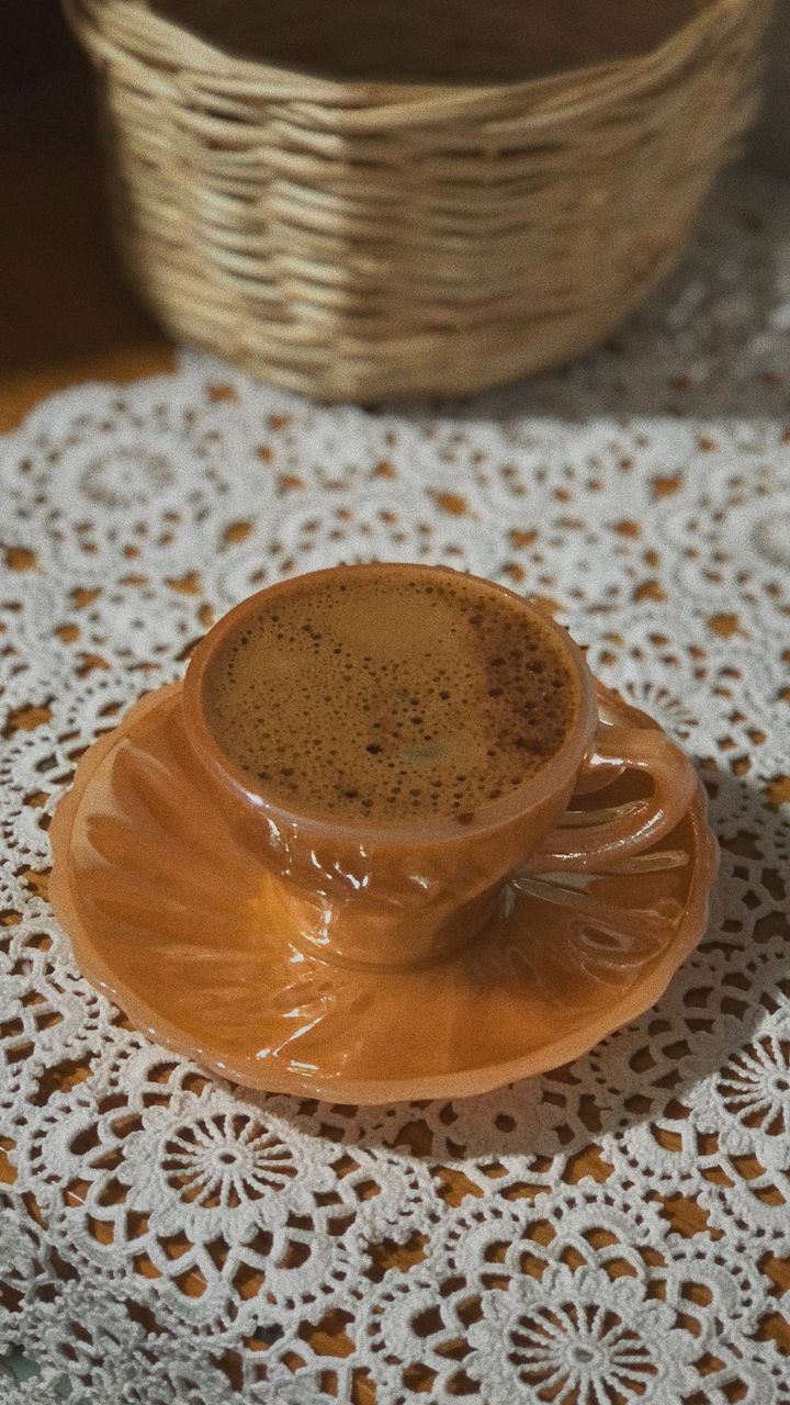 Delicate crocheted doily placed on a counter for a dollar tree coffee bar design