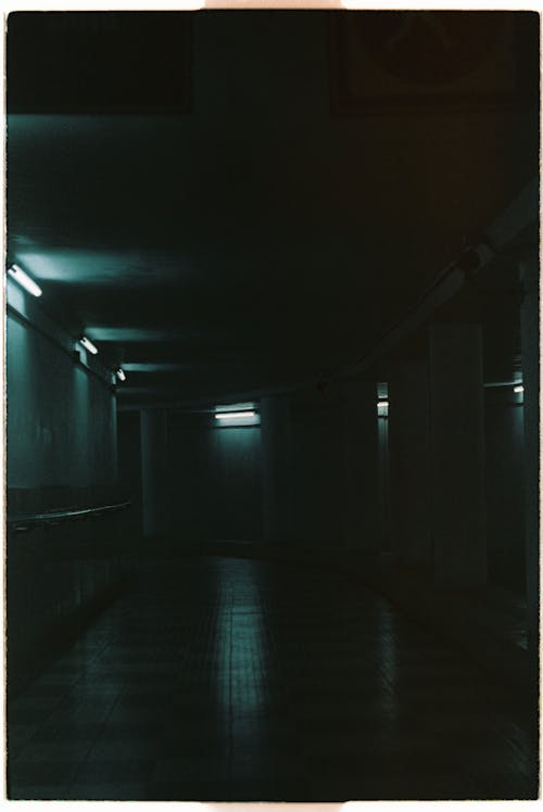 Free Dark Empty Hallway with Dim Lights Stock Photo