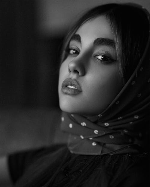 Grayscale Photo of Woman Wearing Hijab 