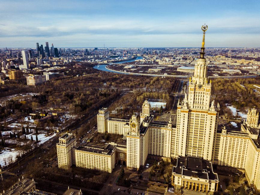 Breathtaking aerial view of Moscow State University and cityscape during spring, showcasing urban architecture.