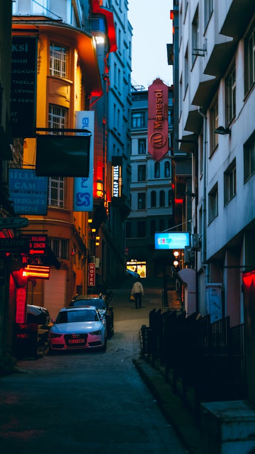 Alleyway between Buildings during Nighttime