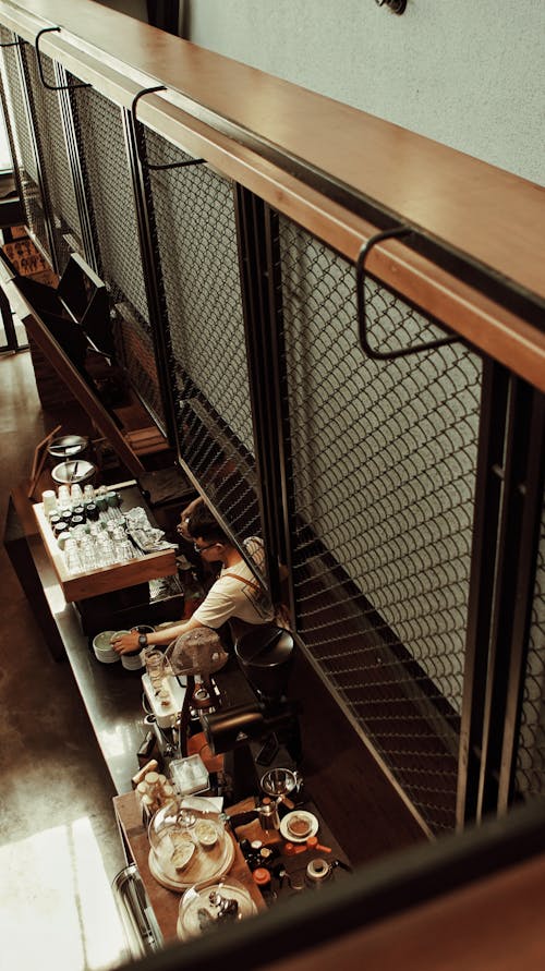 Free Man in White Shirt Inside Cafe Stock Photo