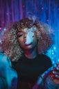 Portrait of Woman with Thick Smoke Coming Out of Her Mouth