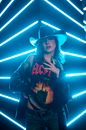 AC/DC Fan Girl Taking Clothes off in Lights of Blue Neon Stripes