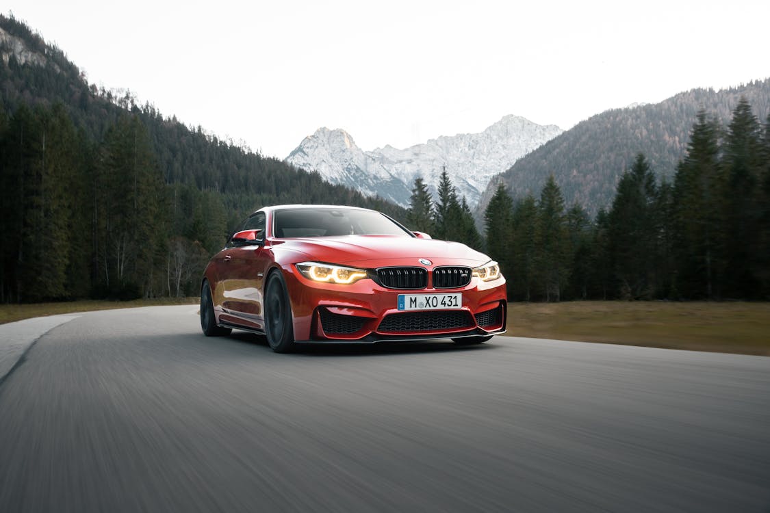 Red BMW Car on the Road 