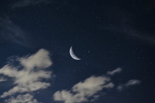 Free Moon in the Starry Night Sky Stock Photo