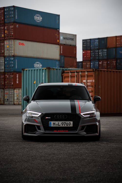 Audi RS 3 Parked near Containers in a Port 