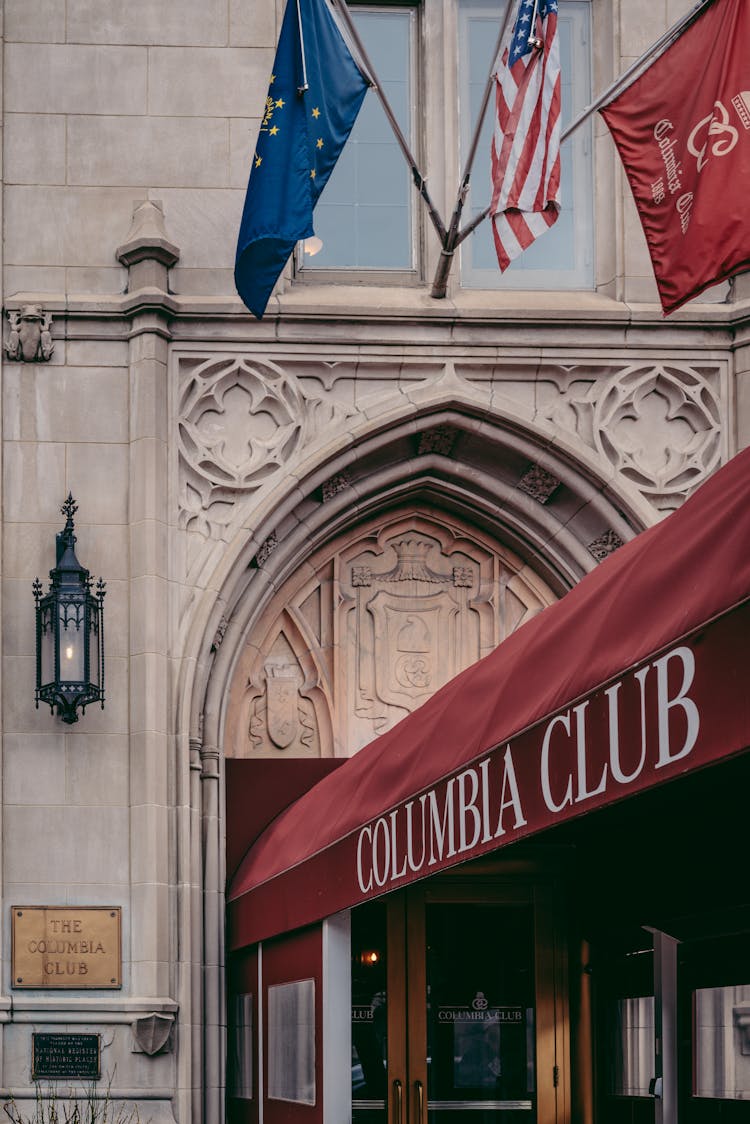 Exterior Of A Building With Flags 