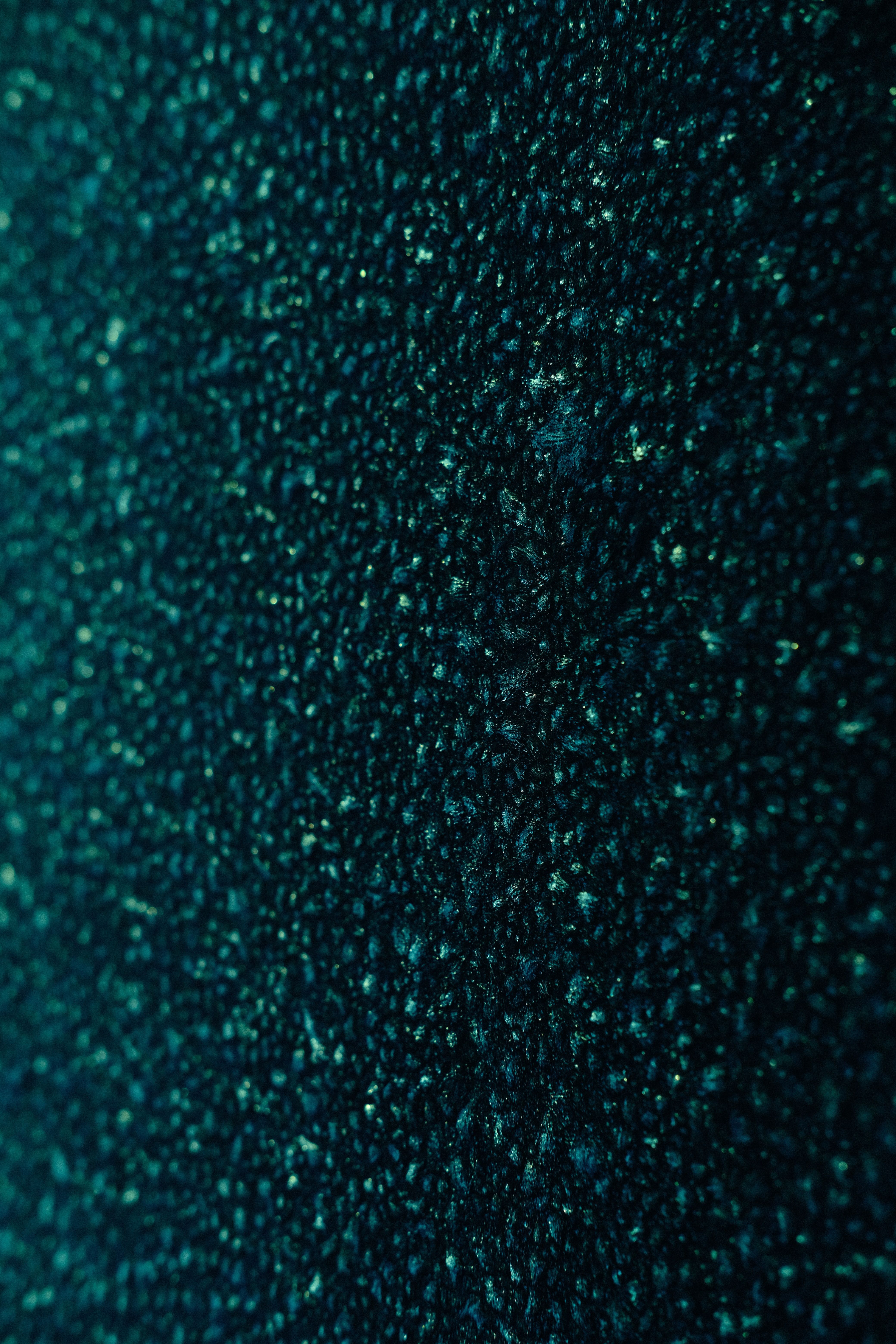 Dark abstract textured surface with intricate patterns