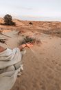 Woman in White Dress on Brown Sand