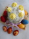 Easter Eggs Beside a  Cake