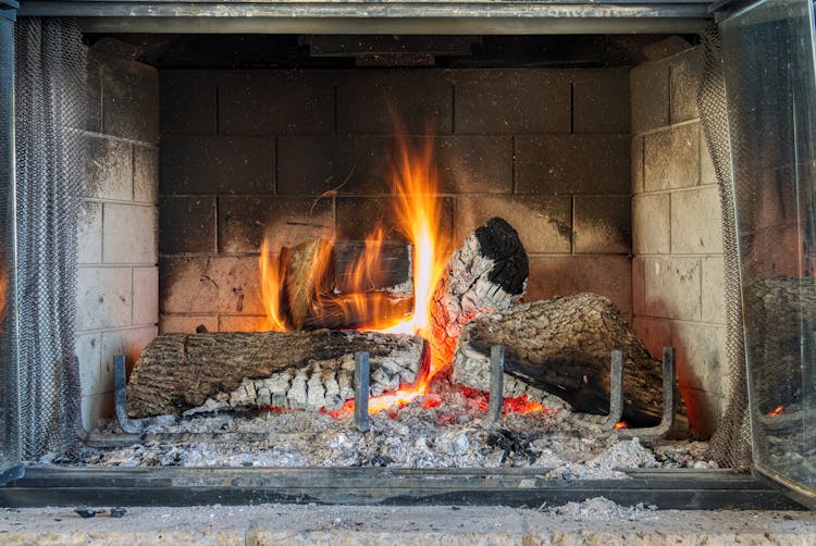 Burning Fire Wood In A Fireplace