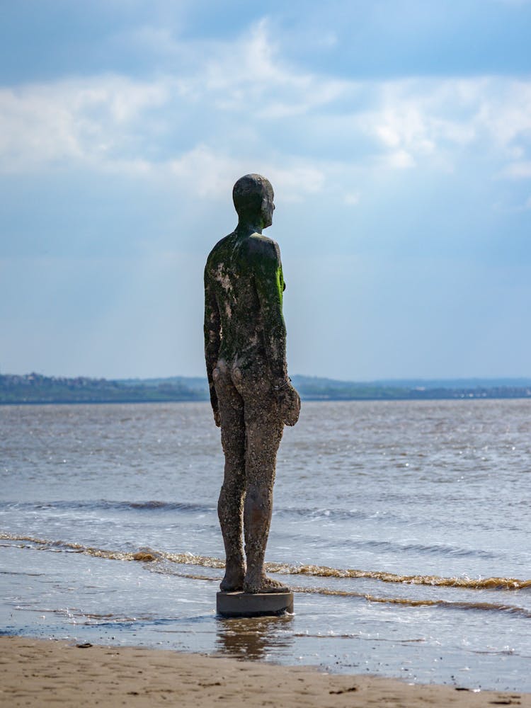 Man Statue On Beach