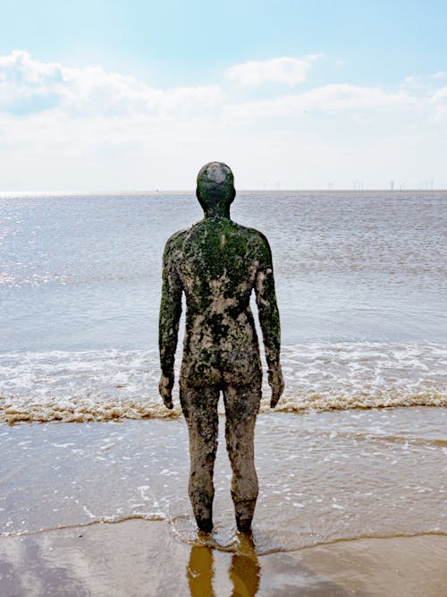 Another Place Statue in Crosby Beach  Merseyside England