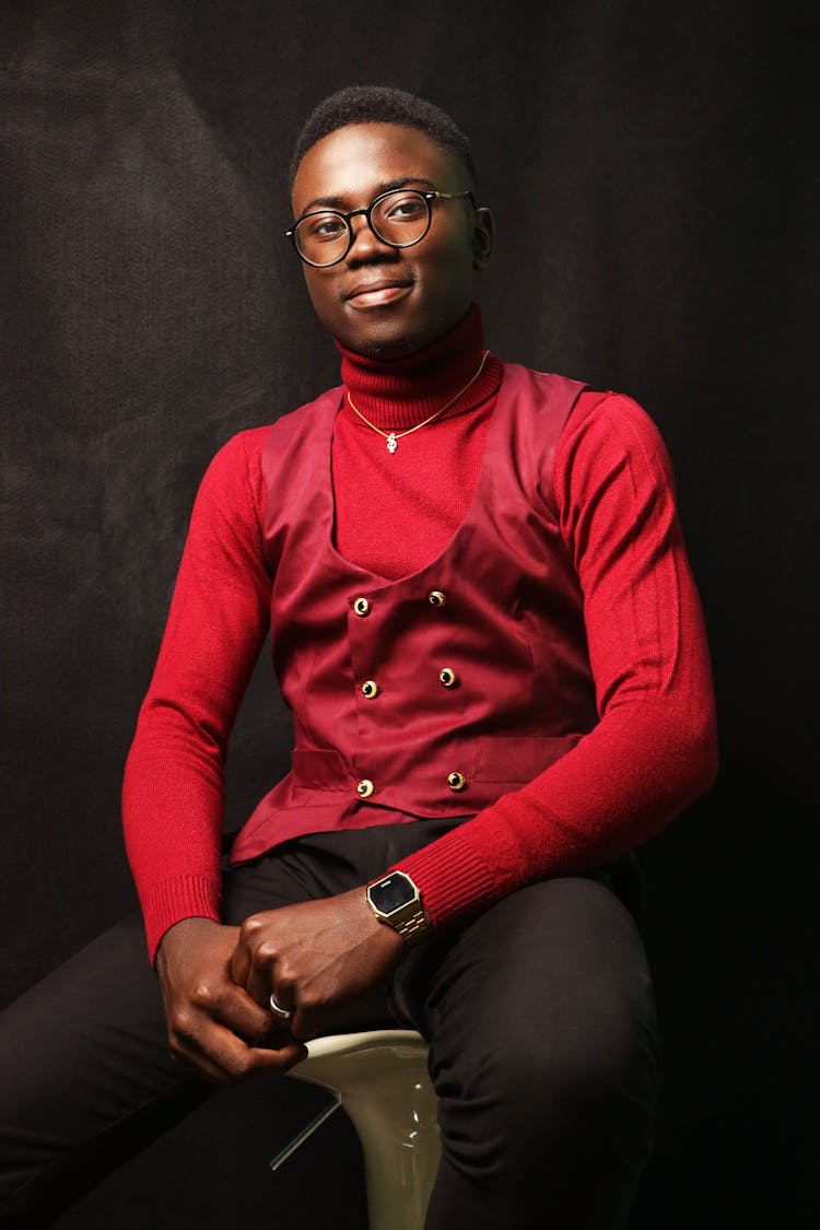 Man In Red Long Sleeve Shirt And Vest