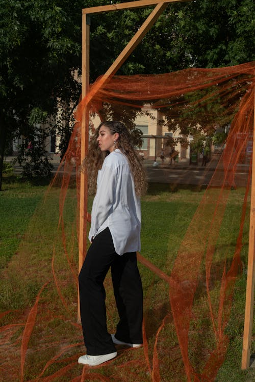 A Woman Standing in a Park