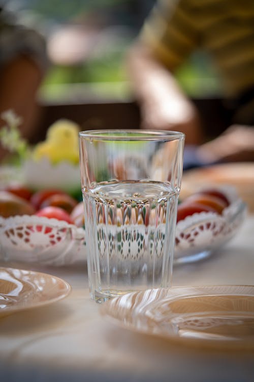 Clear Drinking Glass on a Table 