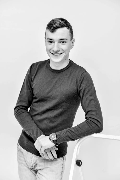 Black and White Photo of a Man Smiling