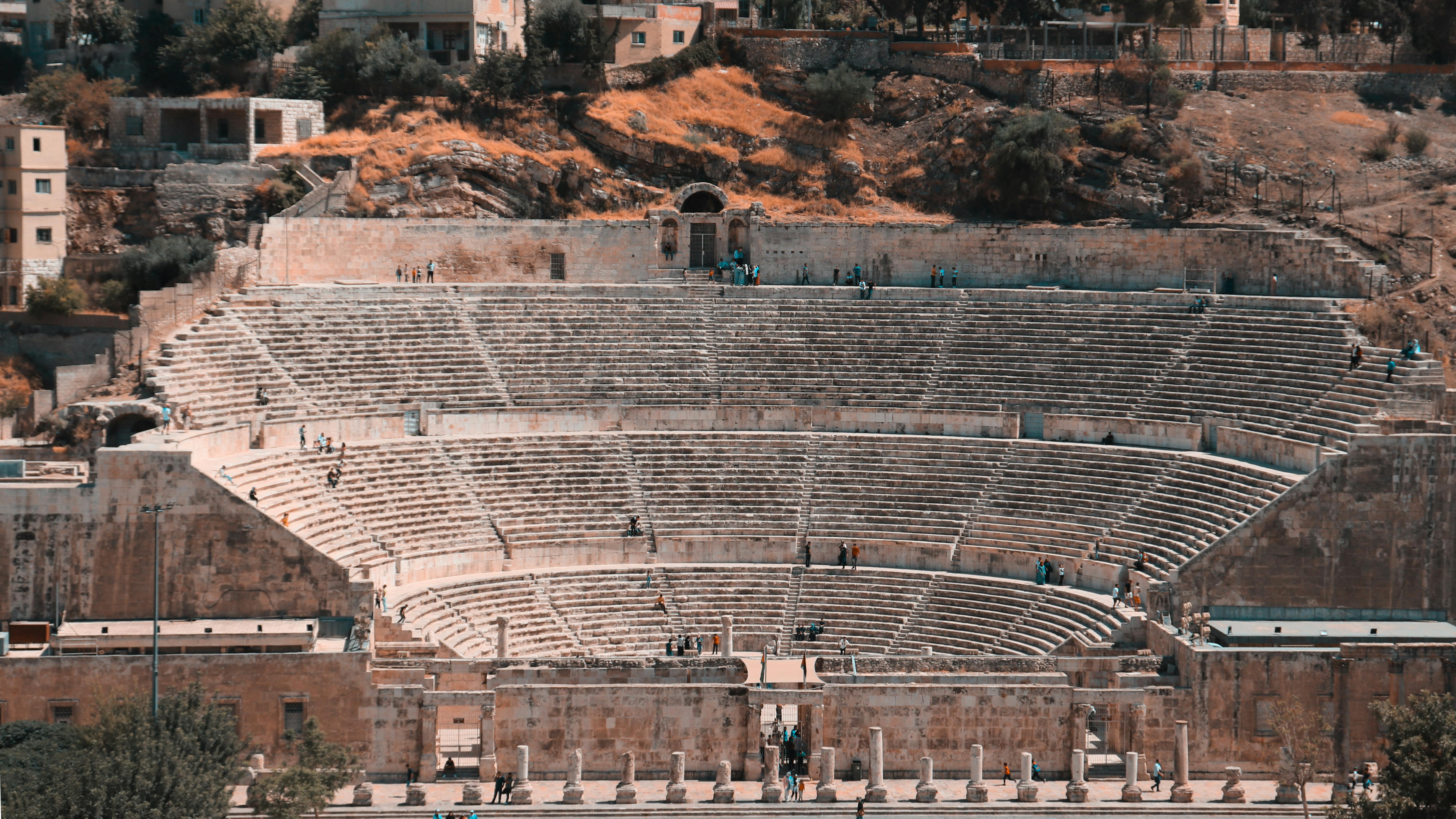 Free Explore the Roman Theater, a prominent historical site in Amman, Jordan, capturing ancient architecture. Stock Photo