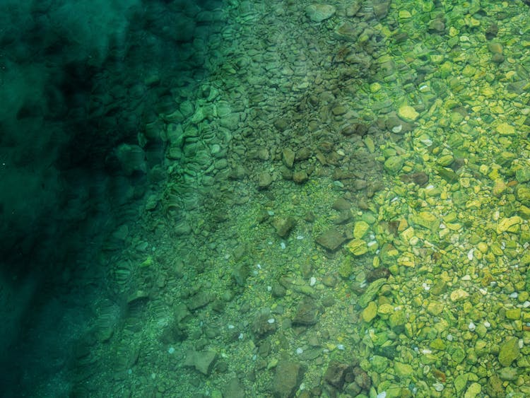 Stones And Pebbles Under Water