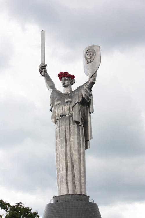 Statue with a Flower Wreath on the Head 