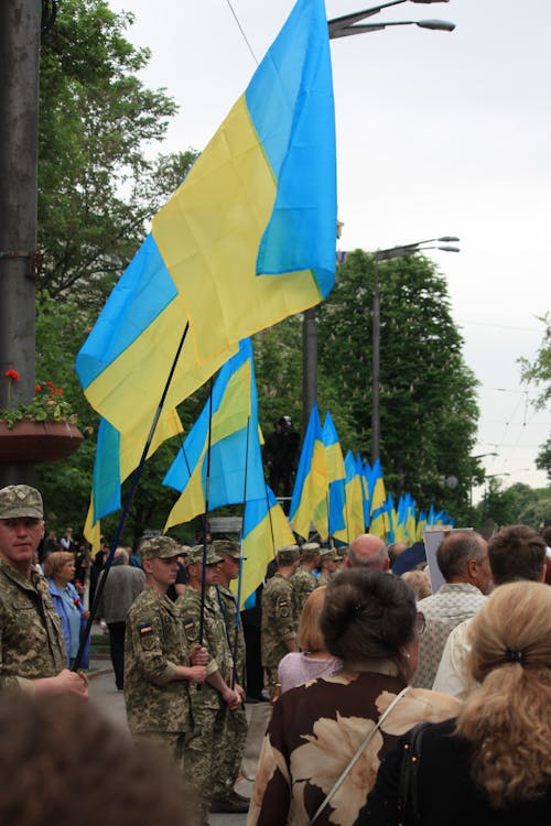 Soldiers with Ukrainian Flags on Street Demonstration