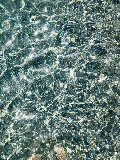 Free Sparkling clear water texture in Rethymno, Greece. Perfect for backgrounds. Stock Photo