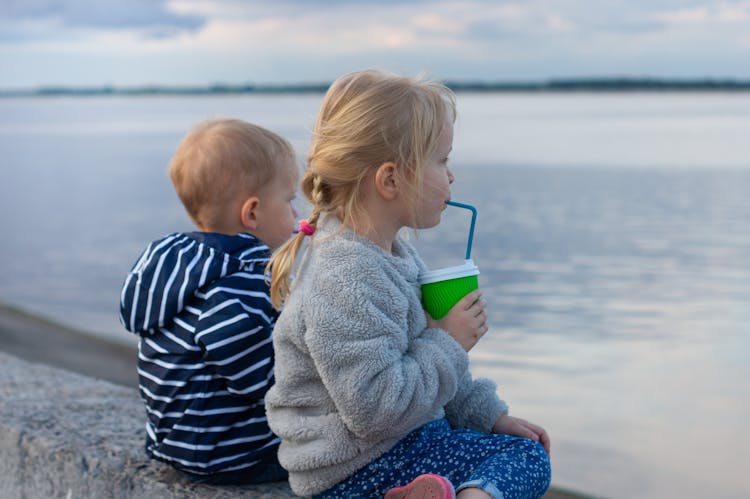 Girl Drinking From A Straw