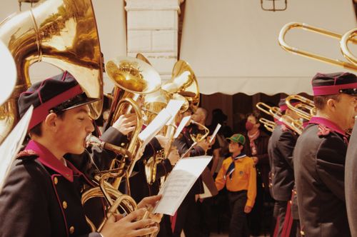Free Energetic marching band playing brass instruments during a parade in Corfu, Greece. Stock Photo