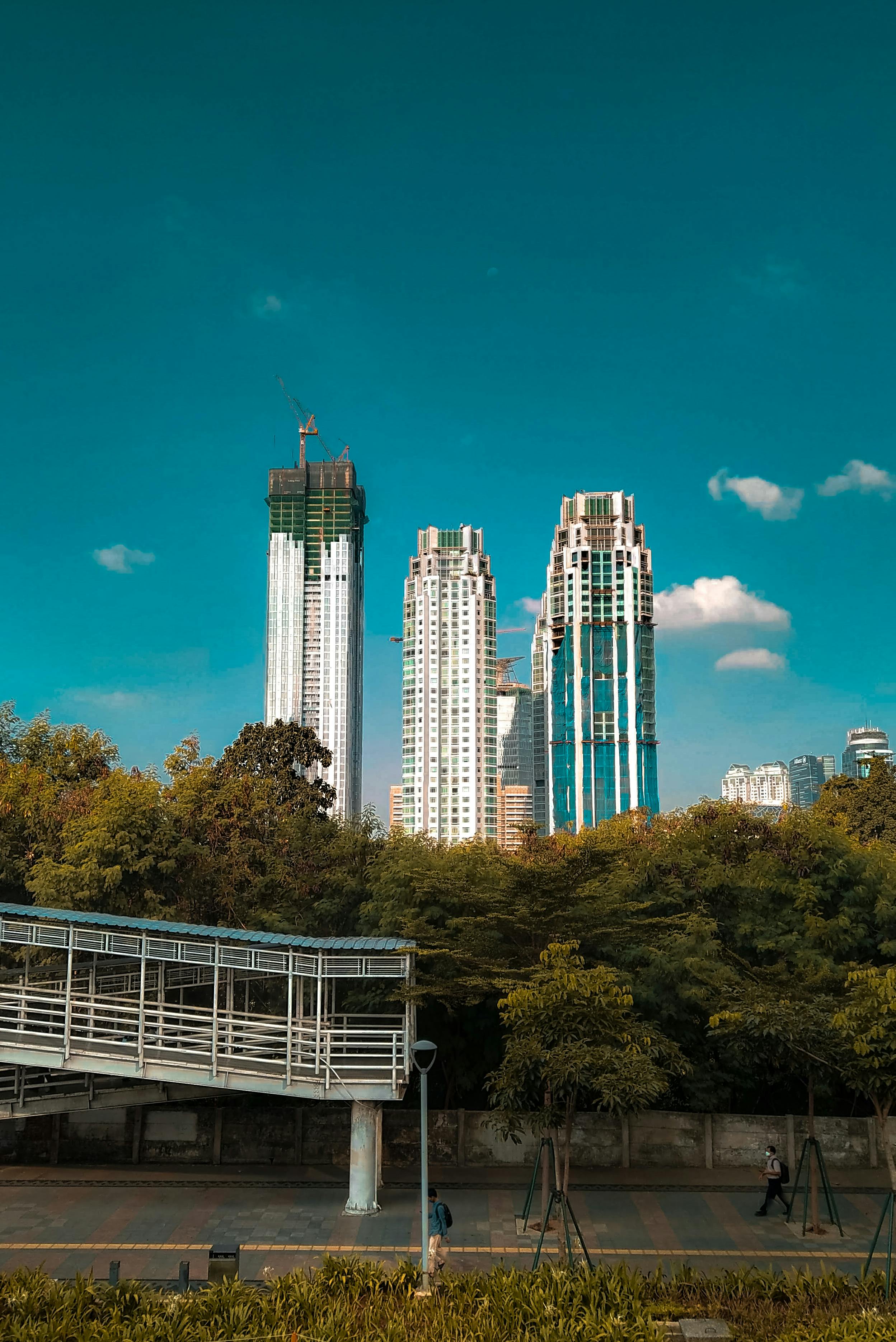 high rise buildings under blue sky