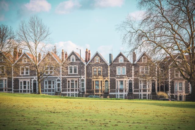 A row of UK Victorian terraced houses, illustrating a portfolio acquisition that qualifies for non-residential SDLT treatment under the six-dwellings rule
