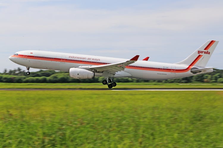 Airplane Taking Off From A Runway