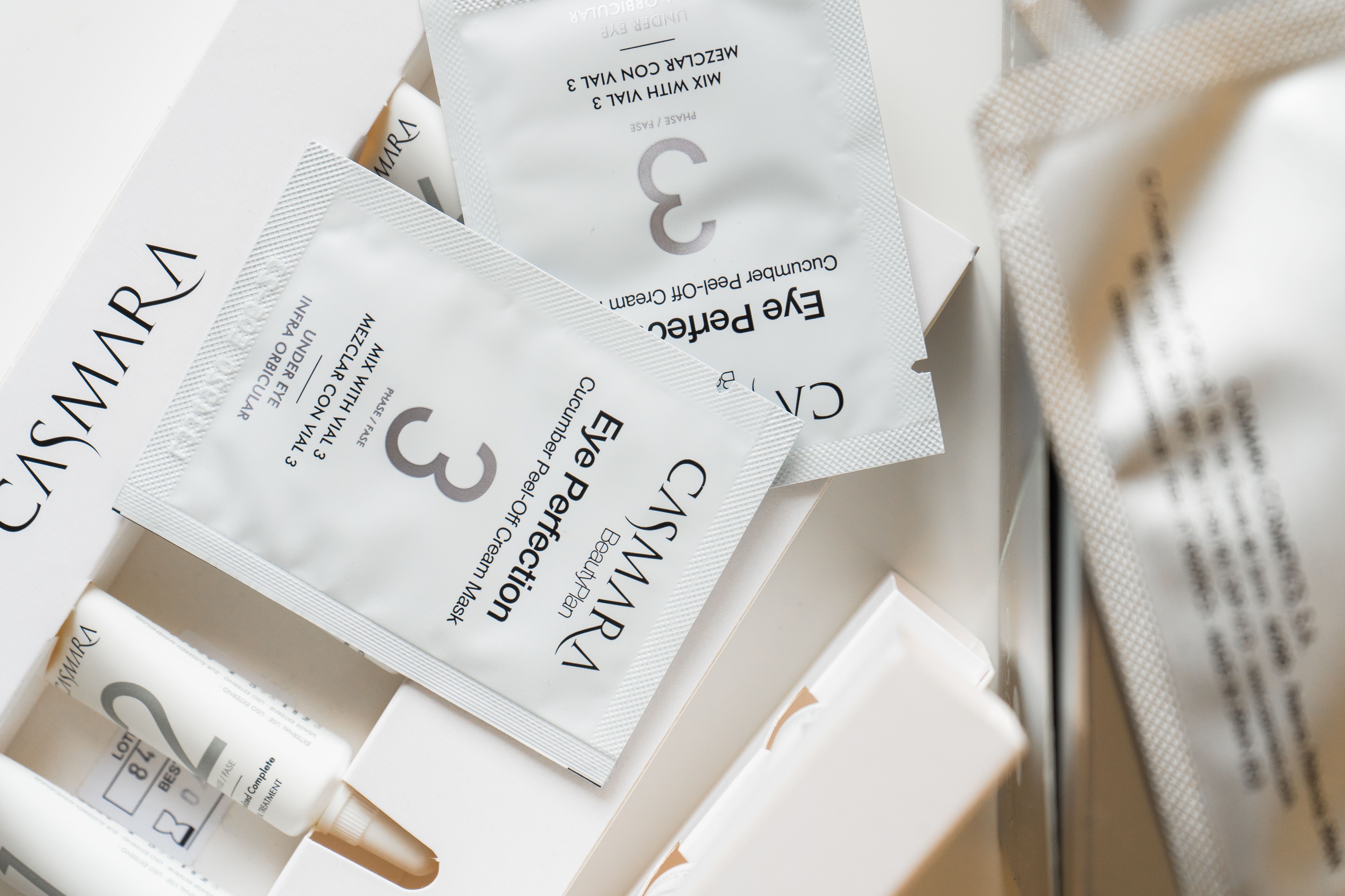 Close-up of Casmara eye cream sachets and packaging, ideal for skincare enthusiasts.